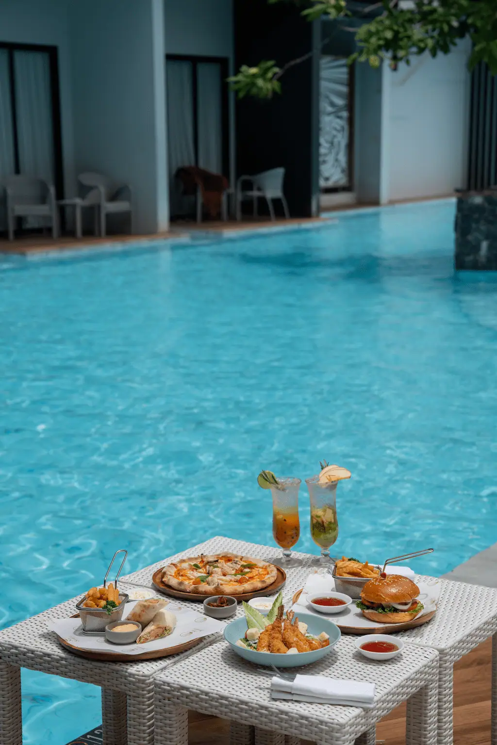 Poolside dining at Sea Seeker Krabi Resort in Ao Nang, Thailand
