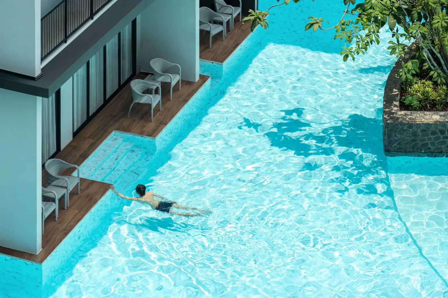Guest swimming in pool at Sea Seeker Krabi Resort, Ao Nang, Krabi